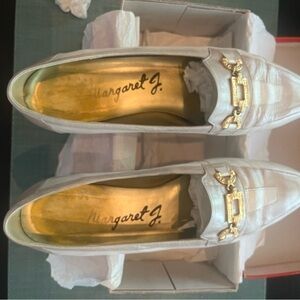 Vintage Margaret Jerrold size 10 leather loafers with gold tone links.